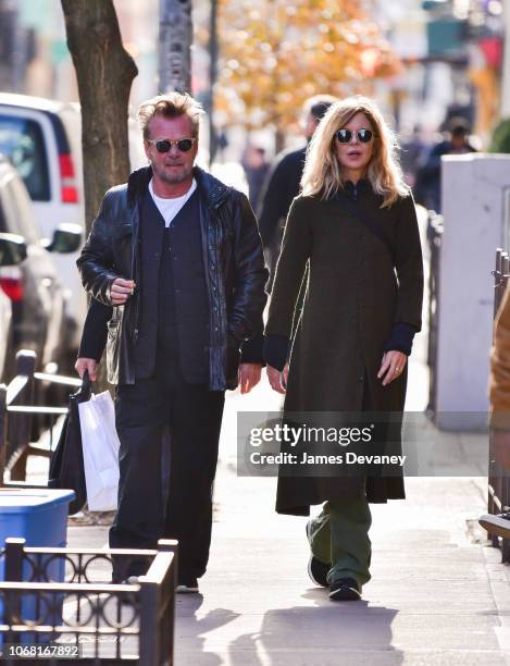 John Mellencamp and Meg Ryan seen on the streets of Manhattan on December 3, 2018 in New York City.