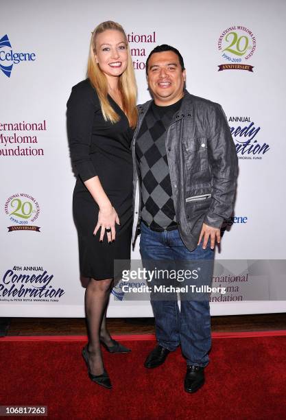 Comedian Carlos Mencia arrives with wife Amy at the International Myeloma Foundation's 4th Annual Comedy Celebration on November 13, 2010 in Los...