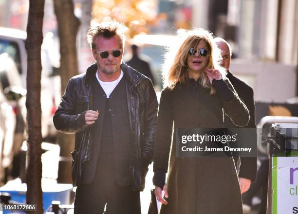 John Mellencamp and Meg Ryan seen on the streets of Manhattan on December 3, 2018 in New York City.