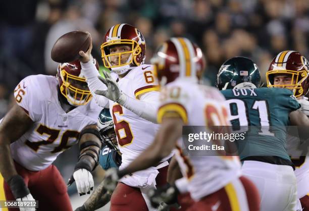 Quarterback Mark Sanchez of the Washington Redskins looks to pass against the Philadelphia Eagles during the second quarter at Lincoln Financial...