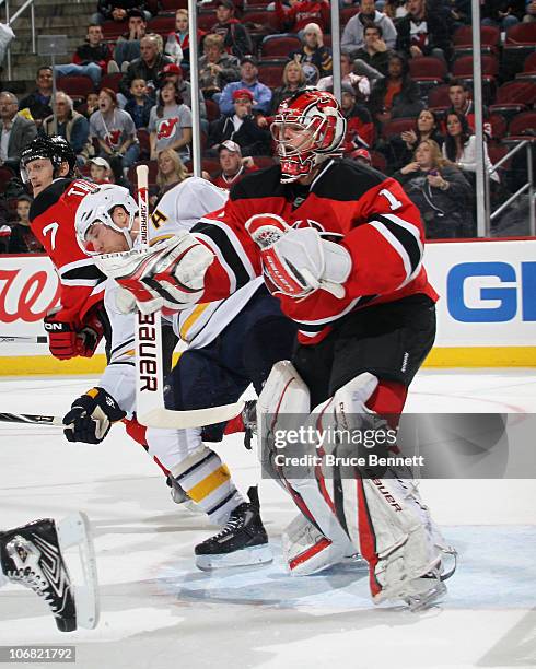 Johan Hedberg of the New Jersey Devils skates against the Buffalo Sabres at the Prudential Center on November 10, 2010 in Newark, New Jersey. The...