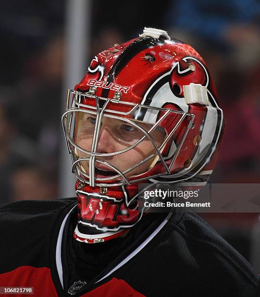 Johan Hedberg of the New Jersey Devils skates against the Buffalo Sabres at the Prudential Center on November 10, 2010 in Newark, New Jersey. The...