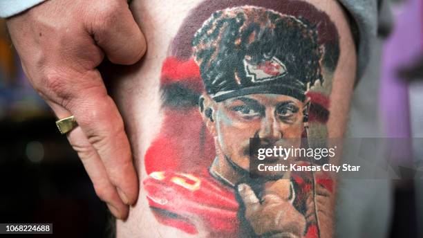 Rob Gaskins displays a tattoo of Chiefs quarterback Patrick Mahomes created by local tattoo artist Jeremy Taylor of Skin Quest Tattoos in Kansas...