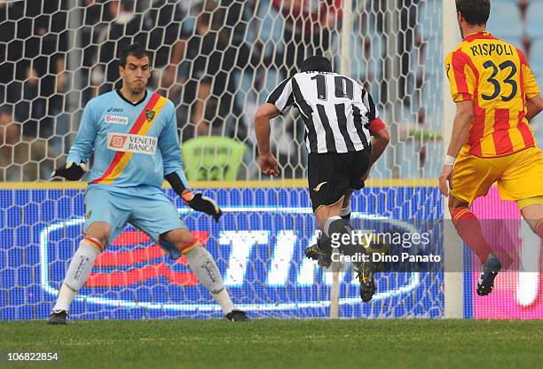 Antonio Di Natale of Udinese shoots to score past Lecces's goalkeeper Antonio Rosati during the Serie A match between Udinese and Lecce at Stadio...