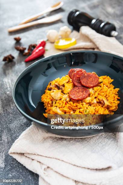 photo by: artpinghung / 500px - paella stockfoto's en -beelden