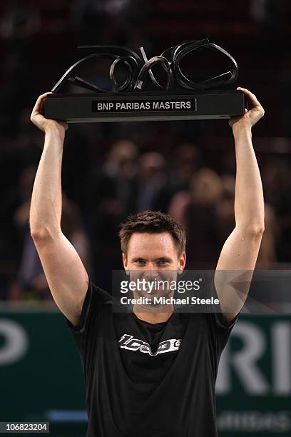 Robin Soderling of Sweden holds aloft the winners trophy after defeating Gael Monfils of France 6-1,7-6 in the final during Day Eight of the ATP...