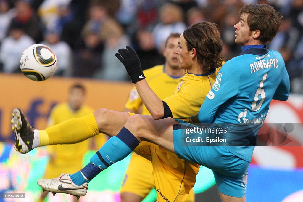 Nicolas Lombaerts Of FC Zenit St Petersburg Battles For The Ball nicolas-lombaerts-of-fc-zenit-st-petersburg-battles-for-the-ball
