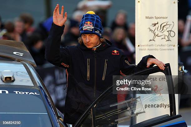 Kimi Raikkonen of Finland and Citroen Junior Team waves to the crowd after after stage three of the Wales Rally GB at Cardiff Bay on November 14,...