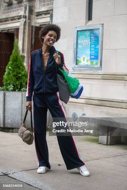 Model Theresa Hayes wears a blue tracksuit, white Tory Sport sneakers after the Tory Burch show during New York Fashion Week Spring/Summer 2019 on...