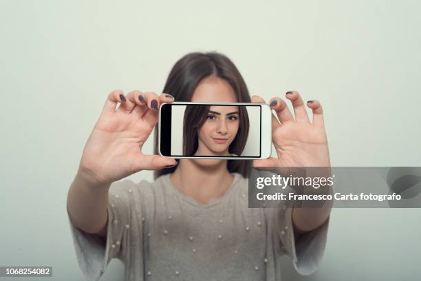 selfie - obscured face phone stock pictures, royalty-free photos & images