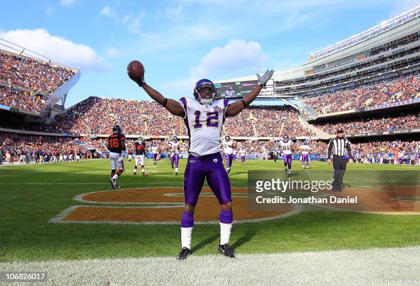 Percey Harvin of the Minnesota Vikings celebrates a touchdown catch against the Chicago Bears at Soldier Field on November 14, 2010 in Chicago,...