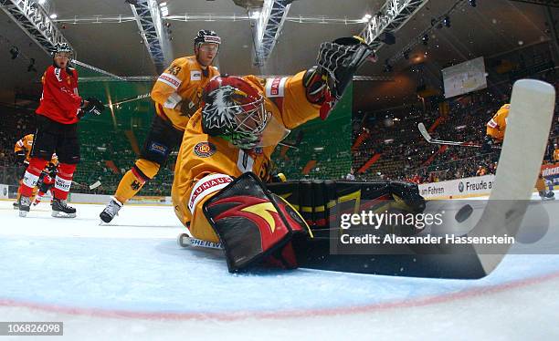 Dennis Endras, goalie of Germany saves the puck during the German Ice Hockey Cup 2010 third round game between Germany and Switzerland at...