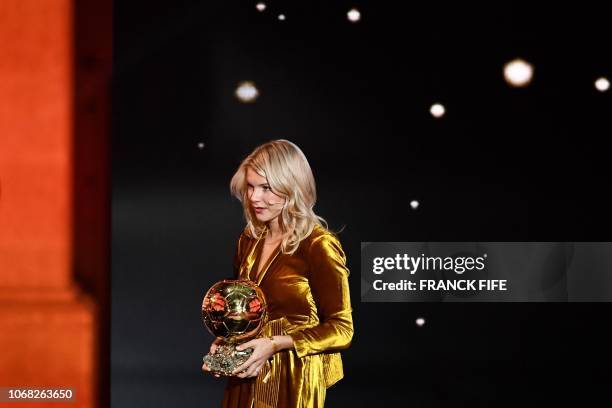 Olympique Lyonnais' Norwegian forward Ada Hegerberg leaves with her trophy after receiving the women's 2018 Women's Ballon d'Or award for best player...
