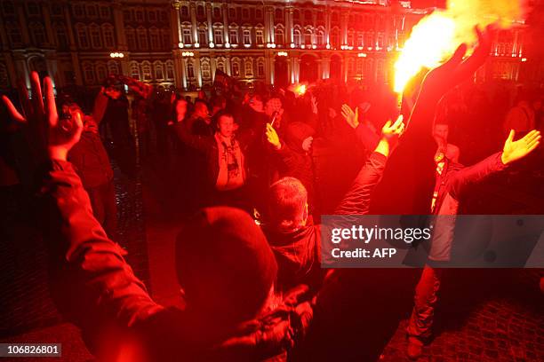 Supporters of Zenit St. Petersburg celebrate the team victory in the Russian Premier league football championship final match against FC Rostov in...