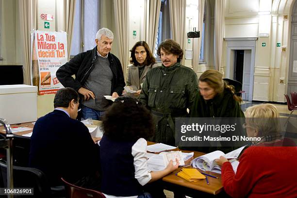 Alessandro Profumo , former CEO of Unicredit SpA, and his wife go to vote at the PD party primary to select a candidate for the 2011 Milan mayoral...
