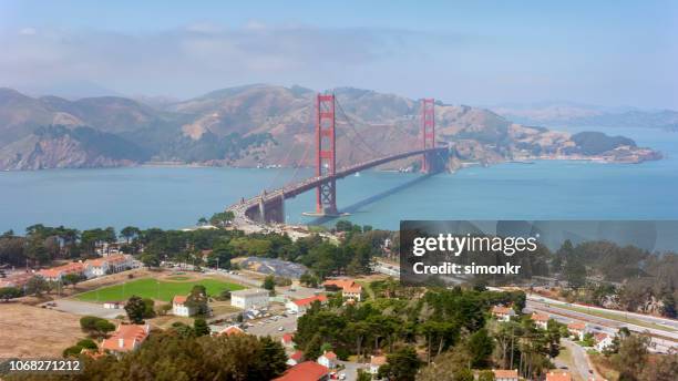 aerial view of golden gate bridge viewed from presidio in san francisco - the presidio stock pictures, royalty-free photos & images