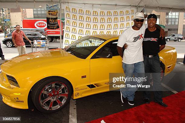 Tyson Beckford and Tony Brakohiapa with Saleen Mustang as part of McDonalds Premium Ride Sweepstakes