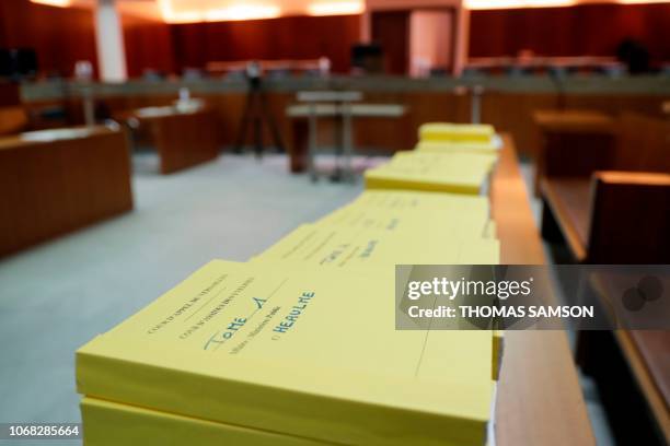 Files are seen ahead of an appeal trial of serial killer Francis Heaulme at the courthouse in Versailles, southwest of Paris on December 4, 2018. -...