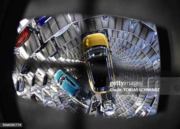 Volkswagen T-Roc and a Volkswagen T-Cross are presented at the storage facility auto tower of German carmaker Volkswagen in Wolfsburg on December 4,...