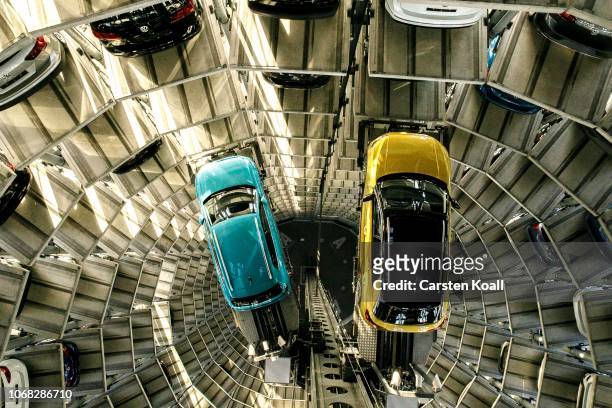Volkswagen T-Cross and a Volkswagen t-Roc are presented in one of the twin car towers at the Volkswagen Autostadt visitors center on December 4, 2018...