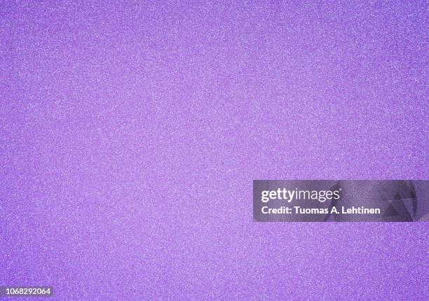 pinkish and purple glitter full frame textured shiny abstract background with vignetting. - purple photos et images de collection