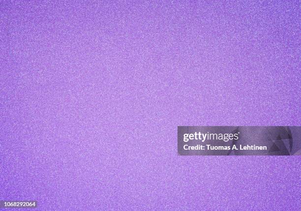 pinkish and purple glitter full frame textured shiny abstract background with vignetting. - purpurfärgad bakgrund bildbanksfoton och bilder