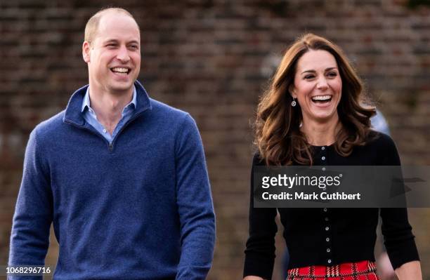 Prince William, Duke of Cambridge and Catherine, Duchess of Cambridge attend a Christmas Party for families and children of deployed personnel from...