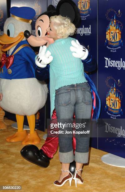 Christina Aguilera with Donald Duck and Mickey Mouse