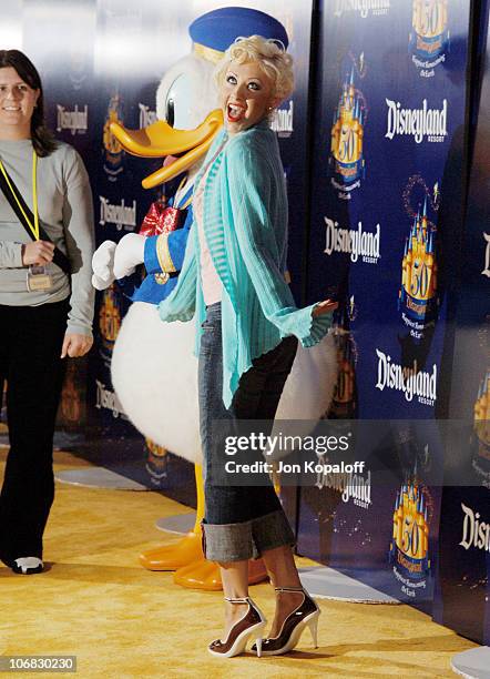 Christina Aguilera with Donald Duck during Disneyland 50th Anniversary "Happiest Homecoming on Earth" Celebration - Arrivals and Fireworks at...