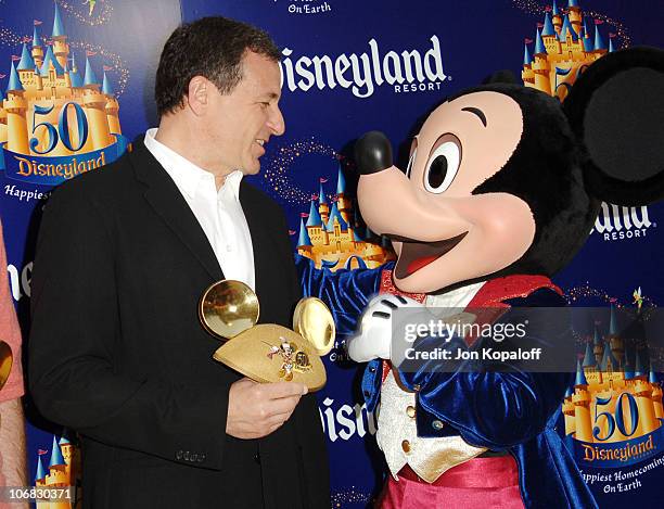 Robert A. Iger with Mickey Mouse during Disneyland 50th Anniversary "Happiest Homecoming on Earth" Celebration - Arrivals and Fireworks at Disneyland...