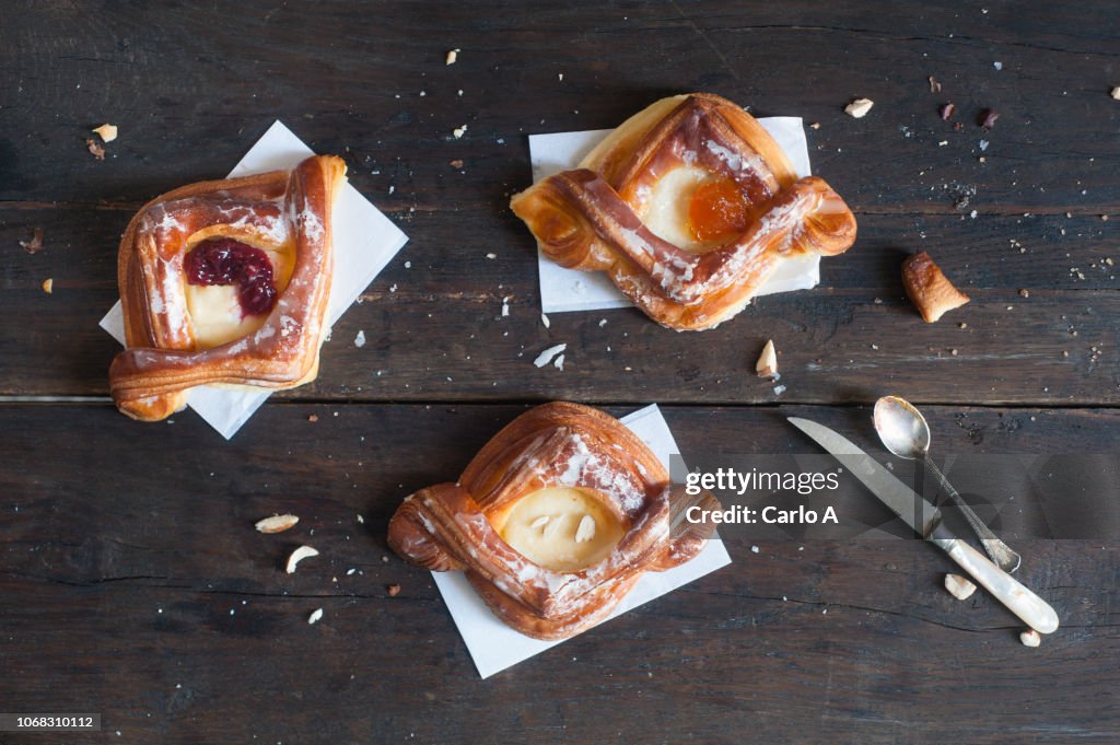 Danish pastries on wood