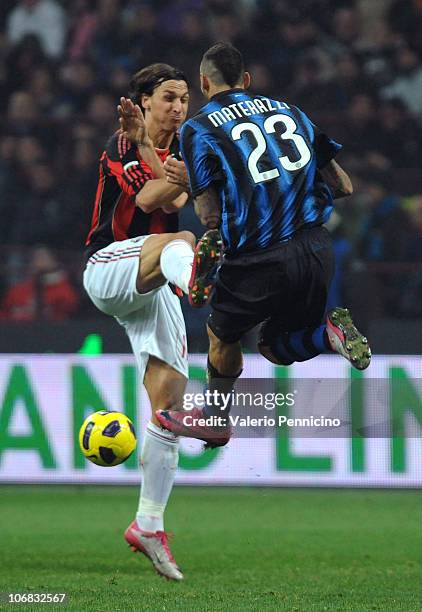 Marco Materazzi of FC Internazionale Milano clashes with Zlatan Ibrahimovic of AC Milan during the Serie A match between FC Internazionale Milano and...