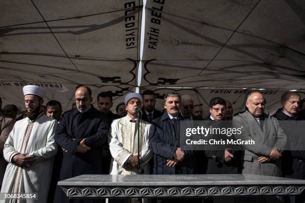 People pray for Saudi journalist Jamal Khashoggi during an absence prayer held after Friday pray at Fatih Mosque on November 16, 2018 in Istanbul...