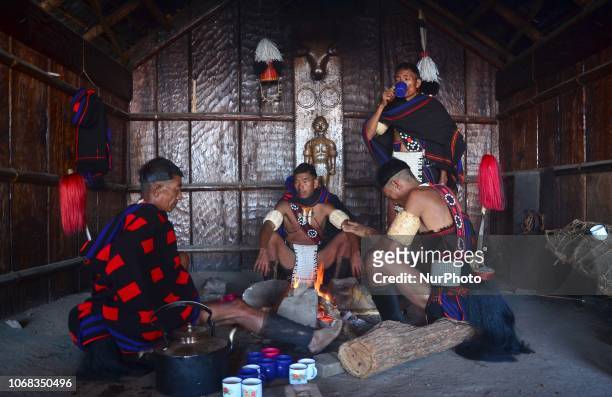 Naga tribesman from Khiamniungan tribes sits inside thier Morung on the fourth day of the Hornbill festival at Kisama, some 10 kms away from Kohima,...