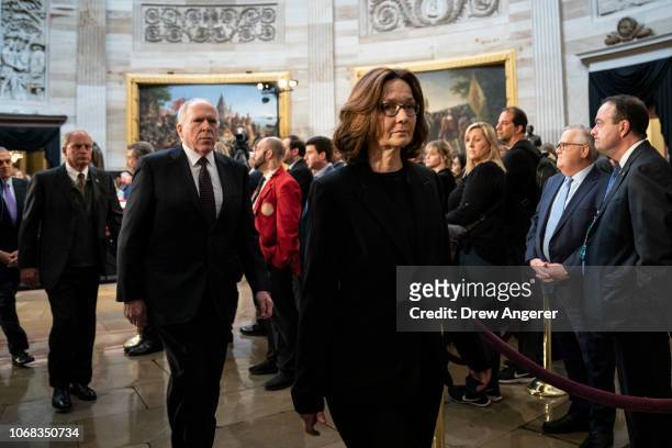 Former CIA Director John Brennan and current CIA Director Gina Haspel depart after paying their respects at the casket of the late former President...