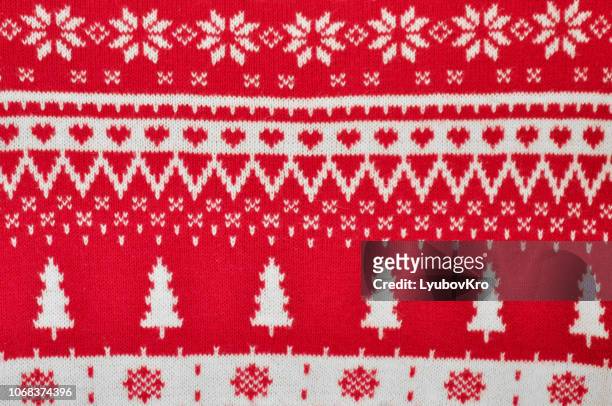 element decor christmas red knitted sweater close-up. holiday gift. backgdound - maglione foto e immagini stock