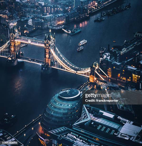 tower bridge aerial view at night - london skyline stock pictures, royalty-free photos & images