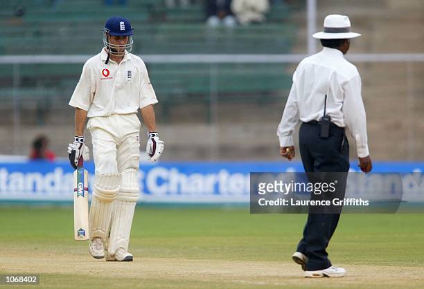 Michael Vaughan of England as he is given out handling the ball during the opening days play of the final Test Match between India and England at the...