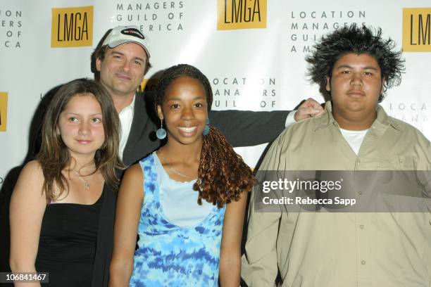 Shane Black with photography competition winners Lorraine Fuentes, Lekeysha Brown and Gerardo Soto