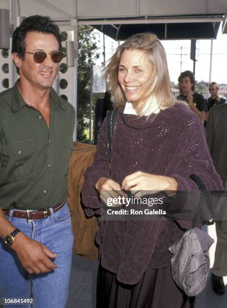 Sylvester Stallone and Lindsay Wagner during Sylvester Stallone and Lindsay Wagner Departing for New York City - September 23, 1991 at Los Angeles...