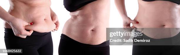 fat belly woman over white background - fat hips stock-fotos und bilder