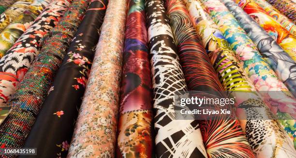 chinese traditional silk rolls - silk garment stock pictures, royalty-free photos & images