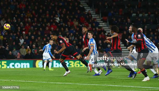 Callum Wilson of AFC Bournemouth scores his team's first goal during the Premier League match between AFC Bournemouth and Huddersfield Town at...