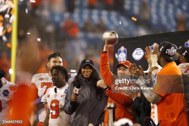 Championship: Clemson coach Dabo Swinney victorious, holding up trophy after winning game vs Pittsburgh at Bank of America Stadium. Charlotte, NC...