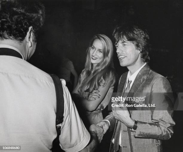 Ron Galella, Jerry Hall and Mick Jagger during Jerri Hall and Mick Jagger Sighting Outside Trax Nightclub in New York City - June 26, 1980 at Trax...