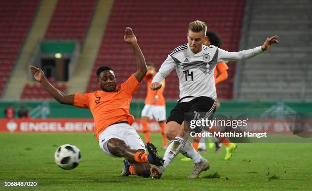 Deyovaisio Zeefuik of Holland challenges Maximilian Mittelstaedt of Germany during the International Friendly match between Germany U21 and Holland...