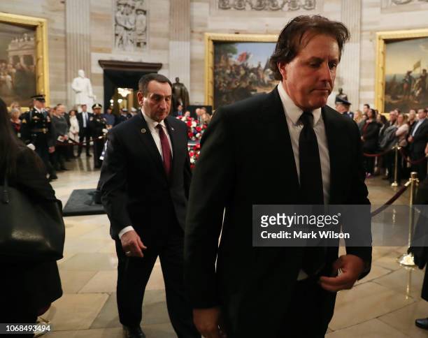 Phil Mickelson walks away after paying his respects in front of the casket of the late former President George H.W. Bush as he lies in state in the...