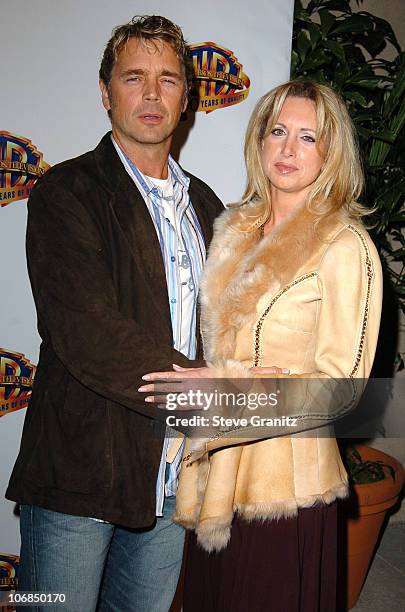 John Schneider and wife Elly Castle during Warner Bros. Television And Warner Home Video Celebrate 50 Years Of Quality TV - Arrivals at Warner Bros....