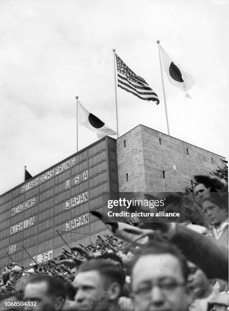 The national anthems of the winner nations USA and Japan were played, while the flags of the winners ran up. The Summer Olympics 1936 were hold in...