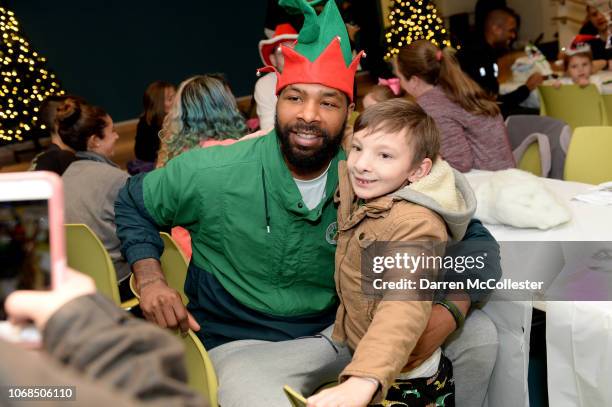 Boston Celtics Marcus Morris visits with Travis at Boston Children's Hospital December 4, 2018 in Boston, Massachusetts.